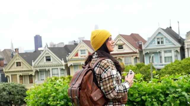 Young female tourist exploring san francisco famous painted ladies