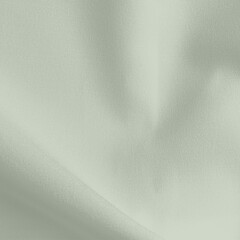 Obraz premium A soft mint green background with a silky texture. The mint green background has a smooth, flowing appearance. Simple green textured background with copy space.
