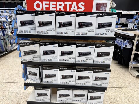 Mallorca, spain, april 14, 2026 kenwood digital media receivers kmm bt209 on retail display shelf with ofertas promotional sign in a store