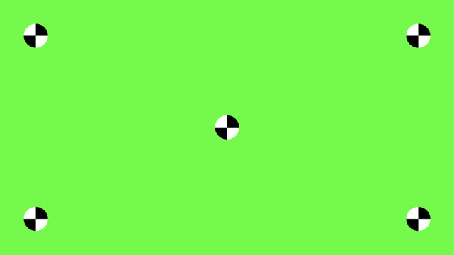 Professional greenscreen setup with tracking points and motion markers for seamless chroma key compositing in cinema and television post-production