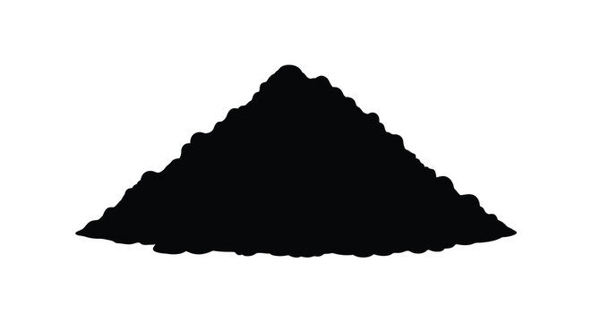 A stark silhouette of a conical pile of dark granular material