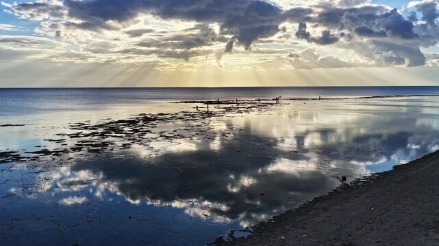 Scenic Dawn With Clouds Reflection Over Mahaba Beach During Low Tide In Barangay Tangkaan, Padre Burgos, Southern Leyte. Aerial Shot