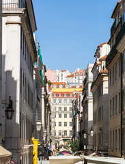 Obraz premium Lisbon, Portugal - 15 April 2024: Narrow streets in the city centre of Lisbon