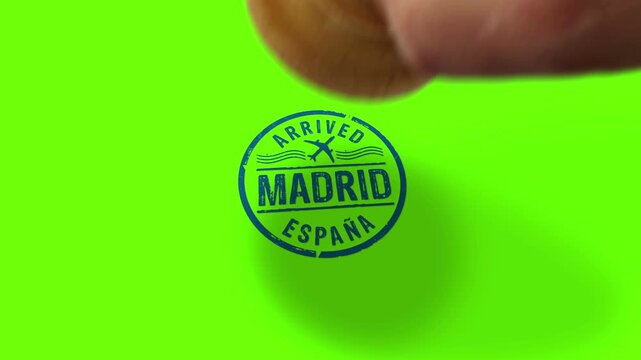Madrid Spain arrived stamp and hand stamping impact isolated animation. Flight arrival 3D concept. Alpha matte channel.