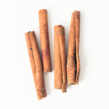 cinnamon sticks on white background