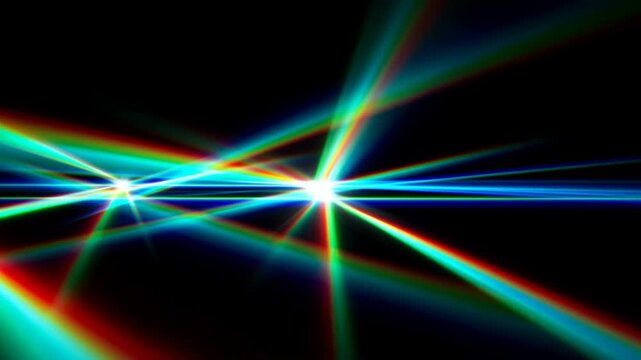 Panning shot of colorful light beams crossing and converging with lens flares and starburst glow over black studio background, dynamic abstract light movement
