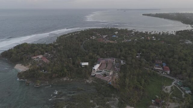 General Luna Siargao Island Cloud 9 boardwalk famous surfing spot in Philippines , aerial drone footage