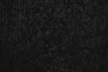 Fototapeta premium Dark textured background with a rough, grunge style in deep black tones