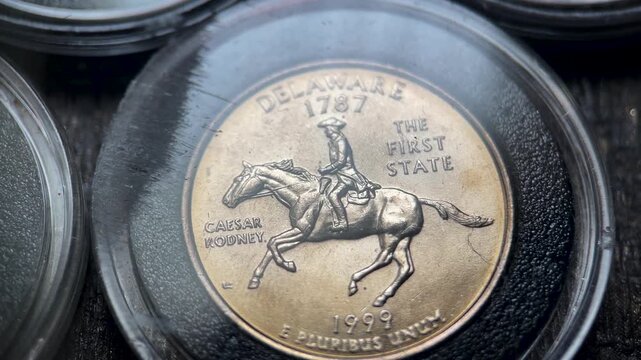 Macro Video of 1999 Delaware State Quarter Dollar Coin with Caesar Rodney Design