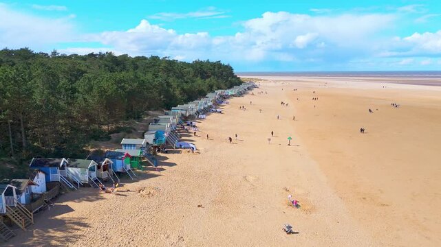 Wells Next to the Sea Beach. Sand dunes where Norfolk Coast path with beach huts and tourist beaches. Beach huts on the promenade at Gorleston-on-sea in Norfolk, UK.