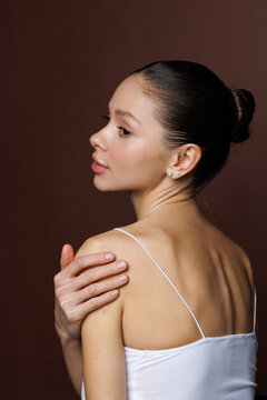 Beautiful portrait of woman on beige background. Skincare solutions, natural beauty.