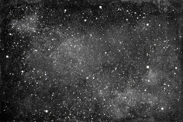 Obraz premium Dark, speckled expanse with numerous tiny, bright star-like points of light