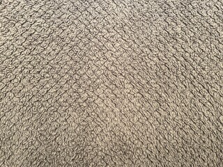 Close-up Background Texture of Soft Brown Fleece Fabric with Diamond Pattern © Al-Jabbar99