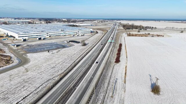 Aerial view of S3 expressway and TPV Displays Poland manufacture in winter season
