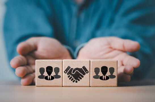 Business partnership and teamwork concept with handshake symbol between customer groups, represent collaboration, trust, networking, client relationship management and alliance for business growth