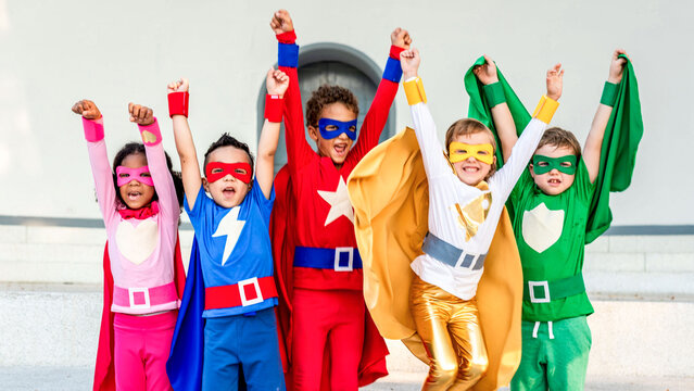 Children in colorful superhero costumes