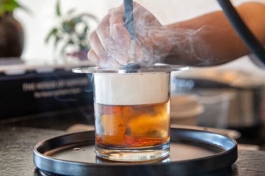 Shun-sational Old Fashioned cocktail and ramen at Sazan, Austin, Texas, October 14, 2025. (Photo by John Anderson)