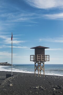 Watch tower on the beach, red flag, Tazacorte, La Palma, Canary Islands, Spain