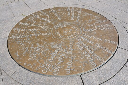 In Muensterplatz square a copper plate shows the distances to other towns, Ulm, Baden-Wuerttemberg, Germany, Europe