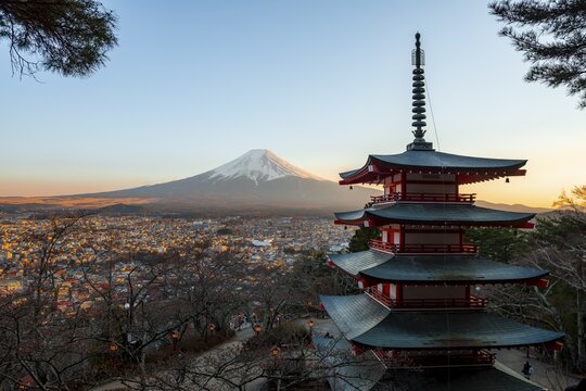 Five-story pagoda of a Shinto Shrine, Chureito Pagoda, with views of Fujiyoshida City and Mount Fuji volcano at sunset, Arakura Fuji Sengen Shrine, Arakurayama Sengen Park, Yamanashi Prefecture, Japan