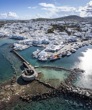Aerial view, town view and harbour of Naoussa, harbour wall with Venetian ruins, Paros, Cyclades, Greece