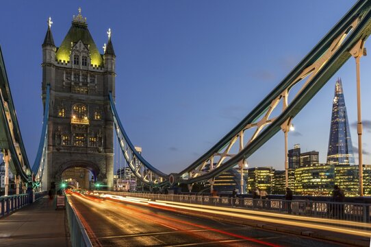 Tower Bridge in the evening, light tracks of passing cars, London, England, Great Britain