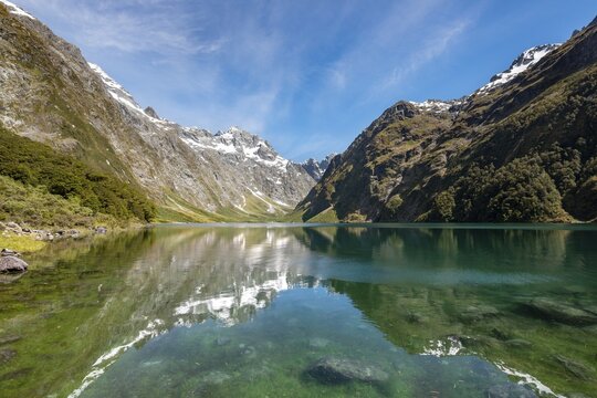 Reflection in Lake Marian, Fiordland National Park, Te Anau, Southland, South Island, New Zealand