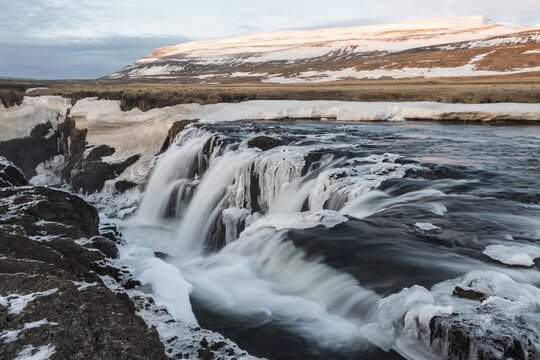 Koluglj&uacute;fur Waterfall, partially frozen, Northwestern Region, Iceland