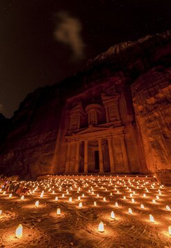 Candles in front of the Pharaoh's treasure house, struck in rock, at night, facade of the treasure house Al-Khazneh, Khazne Faraun, mausoleum in the Nabataean city Petra, near Wadi Musa, Jordan