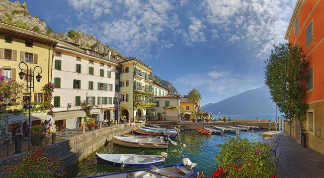 Idyllic fishing village and harbour with colourful boats, Limone Sul Garda, Brescia, Lake Garda West, Lombardy, Italy