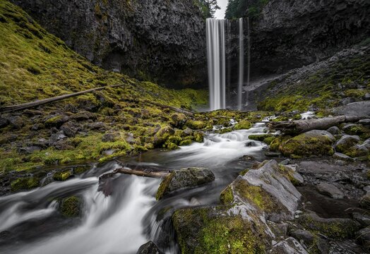 Waterfall cascading over rocky outcrop, Tamanawas Falls, long exposure, Cold Spring Creek, Oregon, USA