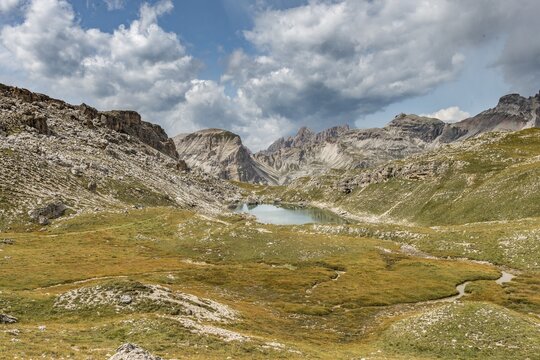 Mountain lake Lech de Crespeina, in the back Col de La Pieres, nature park Park Puez-Geisler, Dolomites, Selva di Val Gardena, South Tyrol, Trentino-Alto Adige, Italy