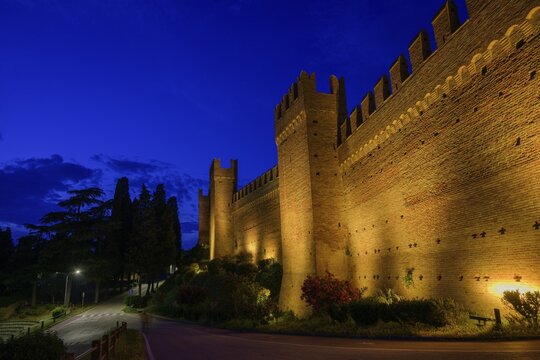 Illuminated city wall of, Gradara, province of Pesaro and Urbino, Italy