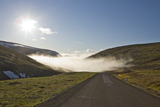 Fog encroaching onto Highway 61, Nor&eth;dalur, Western Fjord, Iceland, Atlantic Ocean