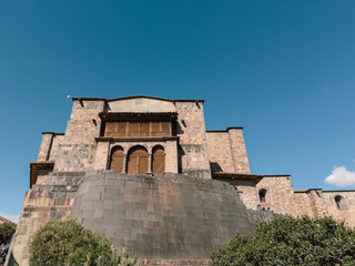 Fototapeta premium Qorikancha Temple Architecture Against Blue Sky