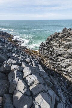 Hexagonal basalt column by the sea, Blackhead, Dunedin, Otago, South Island, New Zealand