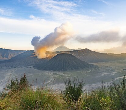 View of volcanoes at sunset, smoking volcano Gunung Bromo, Batok, Mt. Kursi, Gunung Semeru, National Park Bromo-Tengger-Semeru, Java, Indonesia