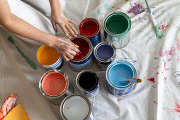 Colorful paint cans creativity.