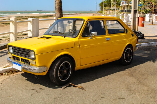 A yellow Fiat 147, the first car model produced by Fiat in Brazil between 1976 and 1986, based on the Italian 127, parked in S&atilde;o Lu&iacute;s, Maranh&atilde;o, Brazil.