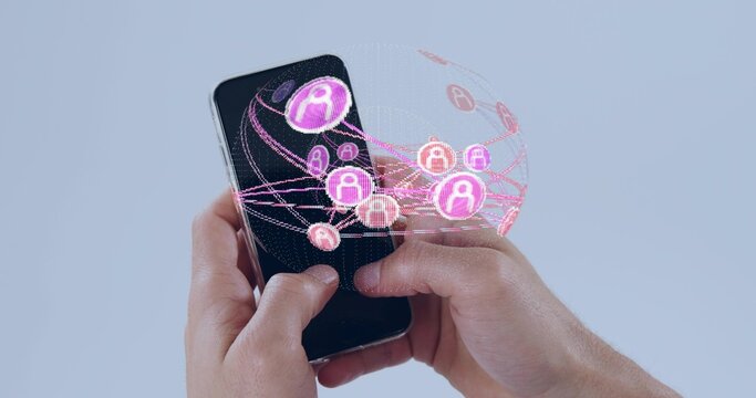 Holding black smartphone, adult hands interacting at studio, displaying holographic network globe