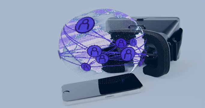 Hovering holographic globe showing purple user icons above pale blue table, VR headset, smartphone