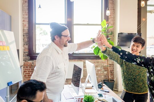 Team celebrating successful collaboration photo