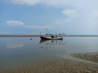 Obraz premium fishing boats on the beach