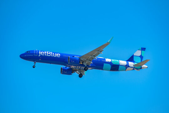 JetBlue Airbus 321-200 neo N2188J, with Mint Leaves livery, landing on Boston Logan International Airport, Boston, Massachusetts MA, USA. 