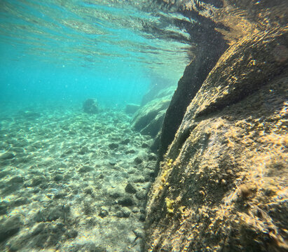 
Underwater image in the clear waters of the Mediterranean Sea in Sardinia during the summer while snorkeling Italy