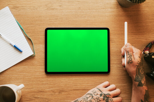 Tablet with green screen display, suitable as mockup