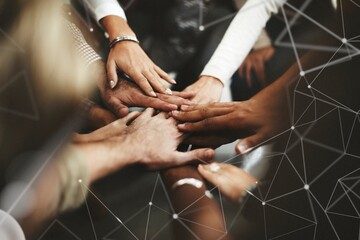 Obraz premium Joined hands for teamwork