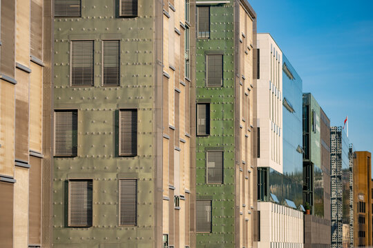 Modern urban corporate offices and buildings facade with concrete windows showing strong architecture pattern in minimalist exterior design for city business use