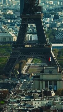 Aerial panning view of the historic center of Paris with the Eiffel Tower at summer day. Panorama of Paris from above. Aerial View on Eiffel Tower and Champ de Mars