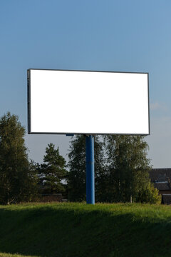 Advertising billboard along the road in the city. Background for design. 
